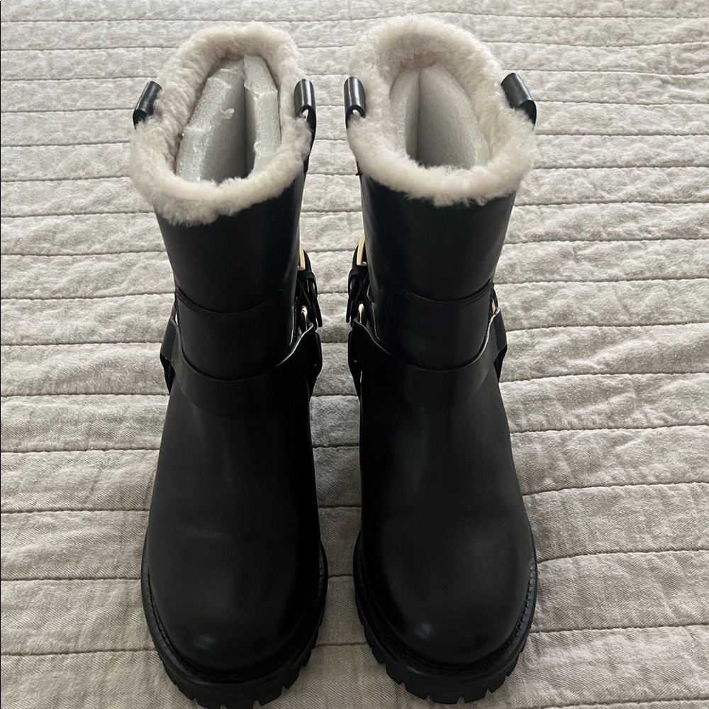Tory Burch Black Ankle Boots with Cream Lining. New....never worn. Size 9